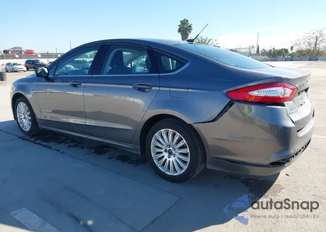 2014 Ford Fusion Hybrid Se z USA, uszkodzony, nr VIN 3FA6P0LU2ER185458